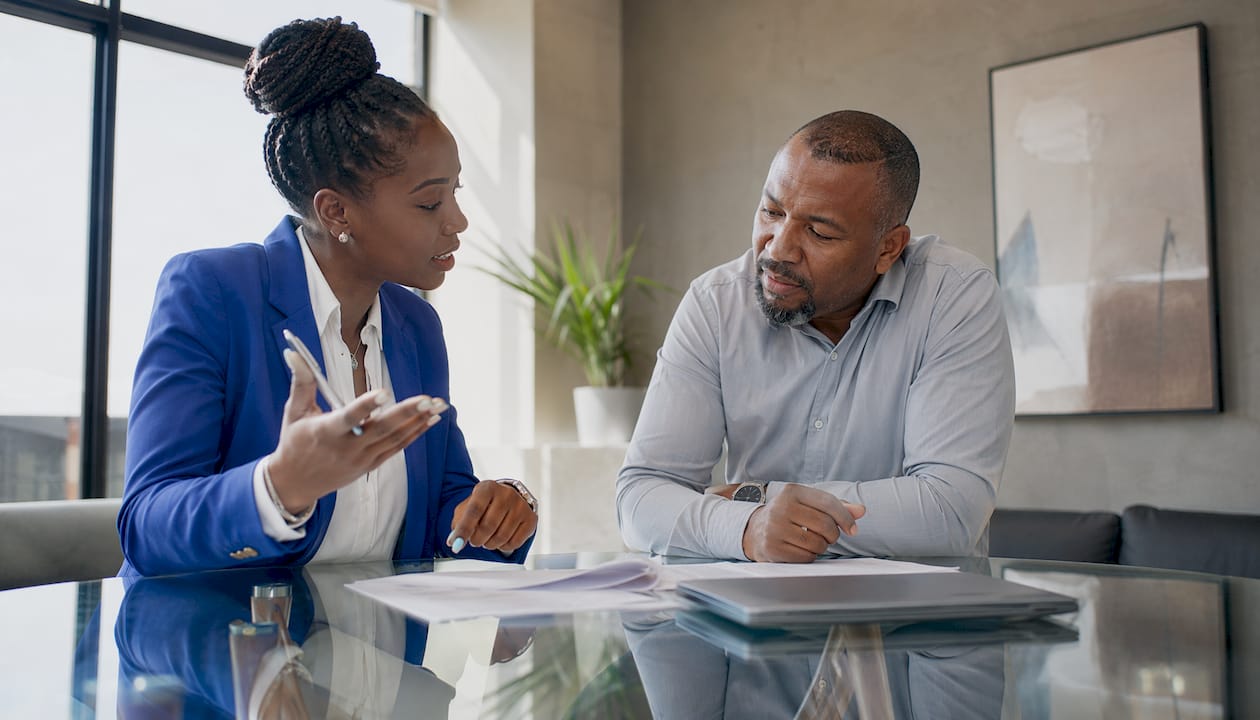 Landlord and advisor discussing insurance claim